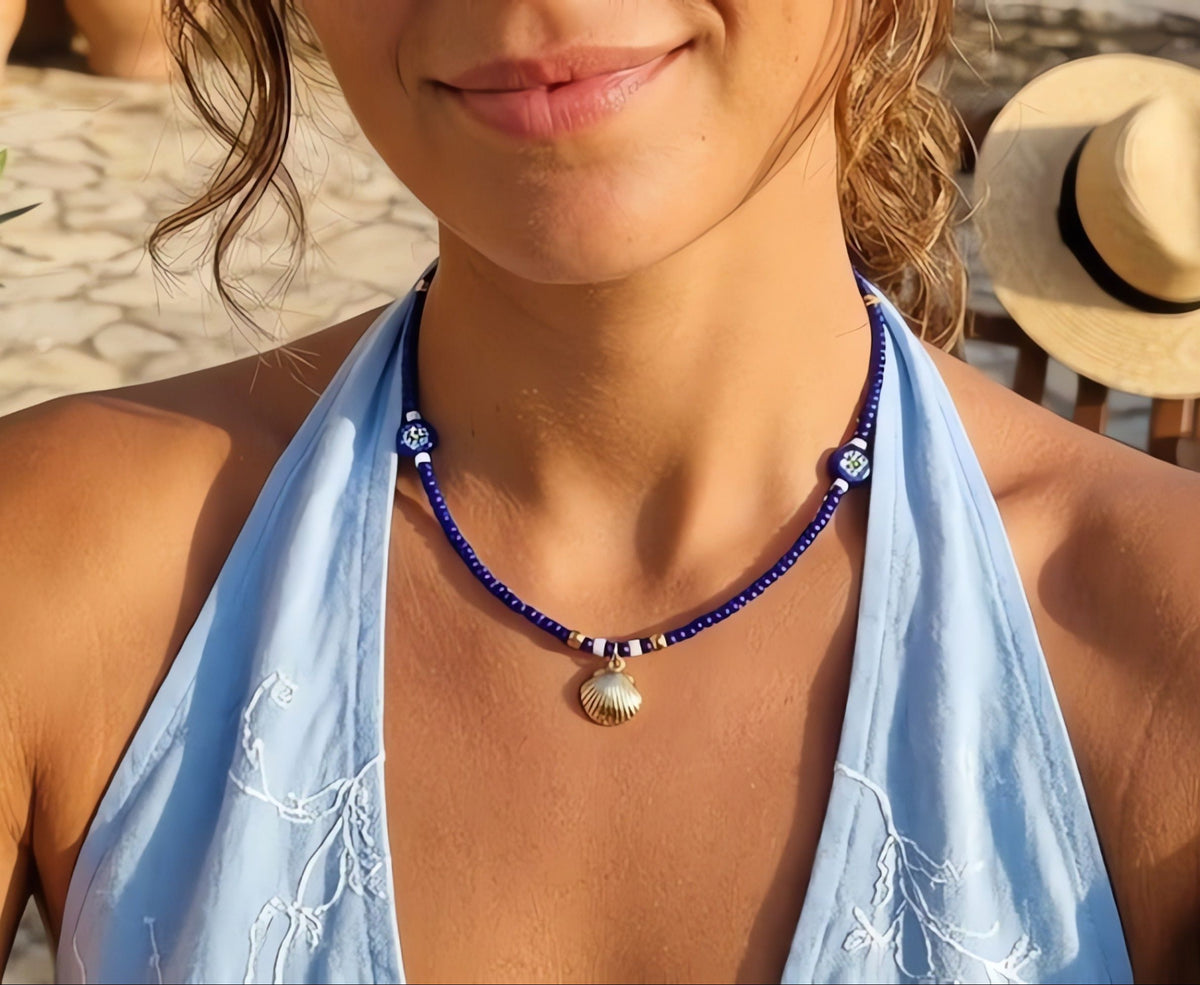 Blue glass beaded choker necklace with seashell charm