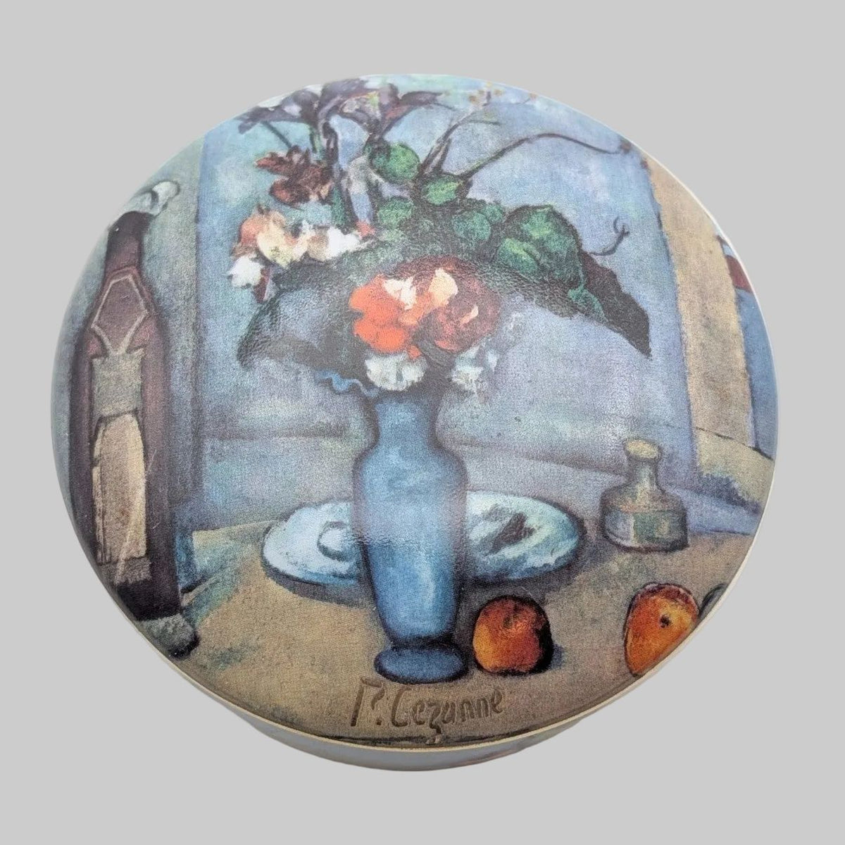 Porcelain art trinket box with blue vase floral painting on round lid