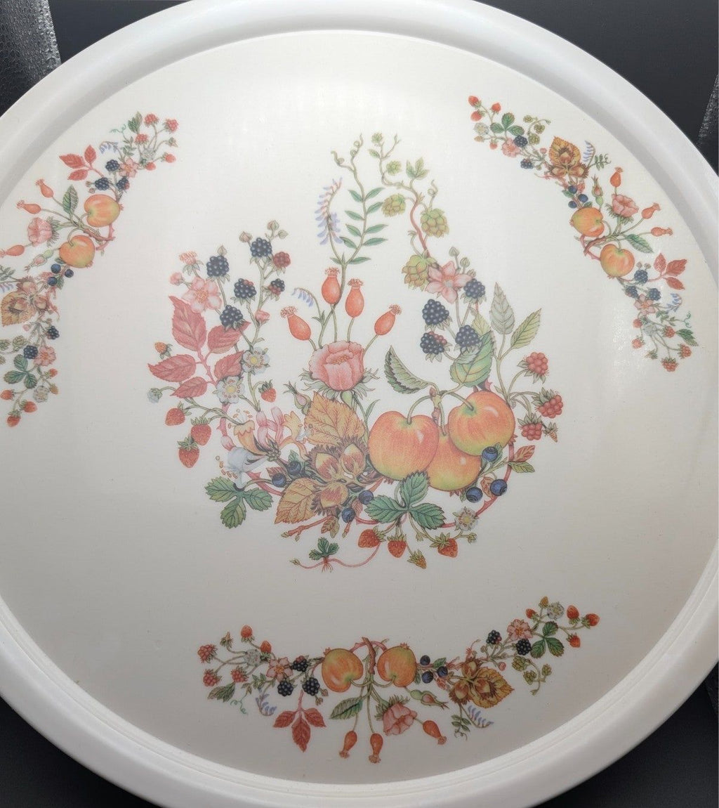 Round white melamine serving tray with colorful fruit and floral garden pattern