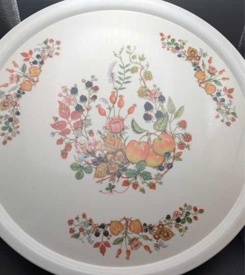 Round white melamine serving tray with colorful fruit and floral garden pattern
