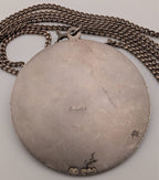 Sterling silver round pendant back with 'SILVER' stamp and link chain