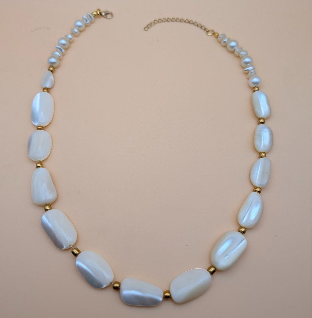 Light blue oval bead statement necklace with gold-tone accents