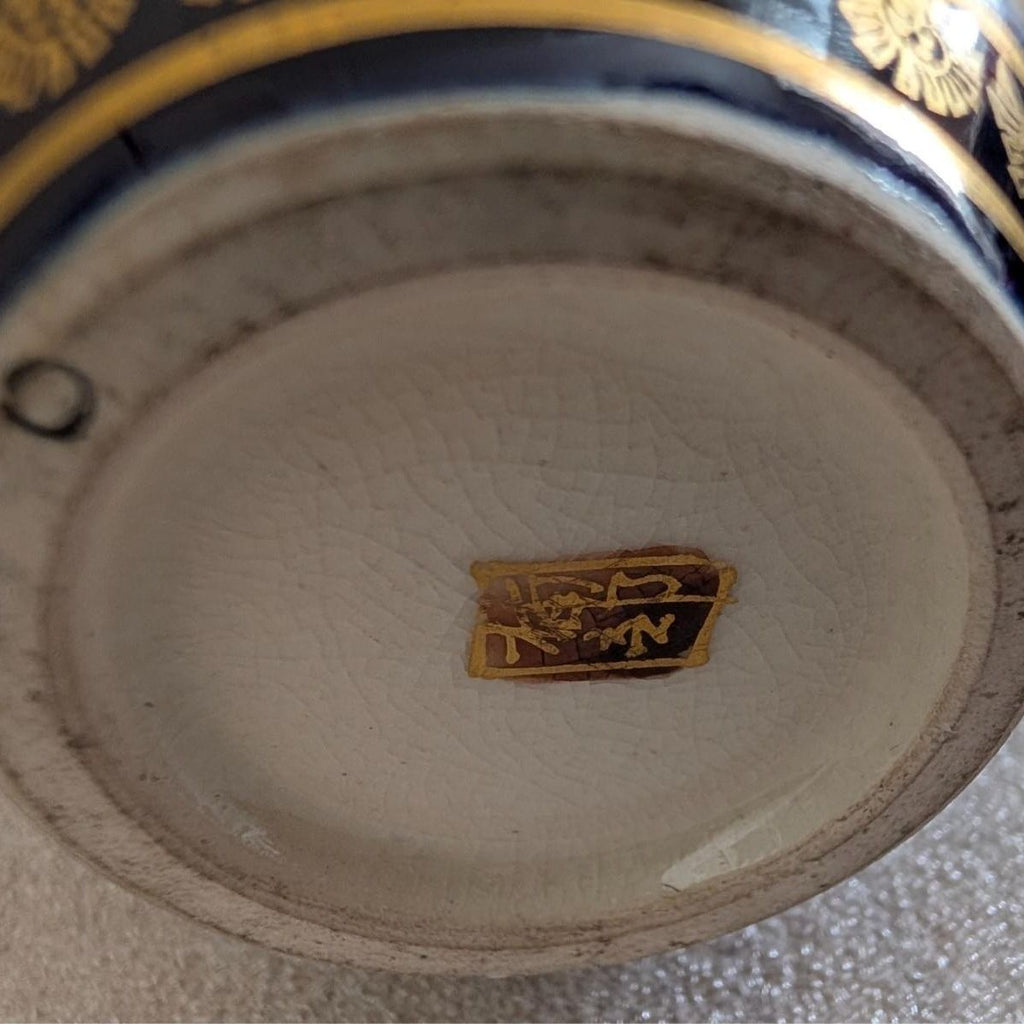 Satsuma-style vase base with gold stamp and ringed underside