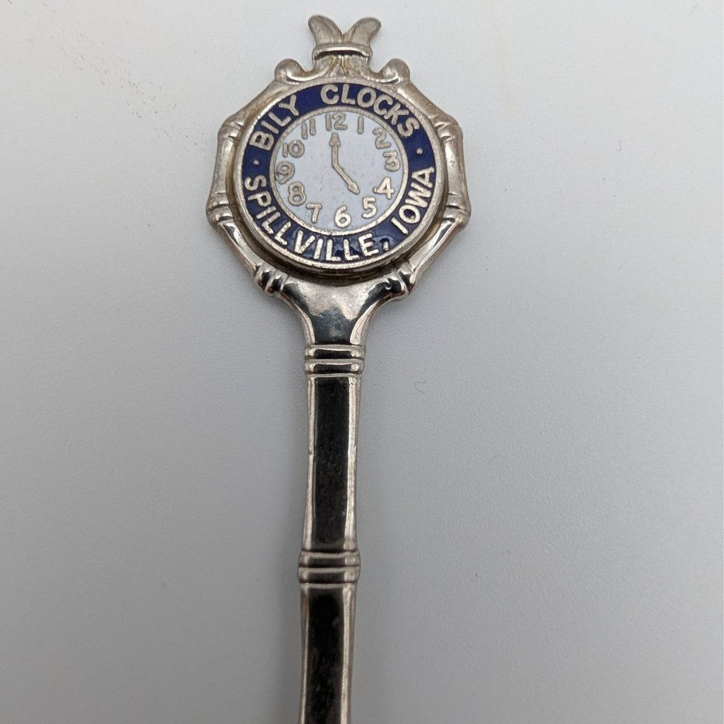 Silver collector spoon top with round "Billy Clock" medallion