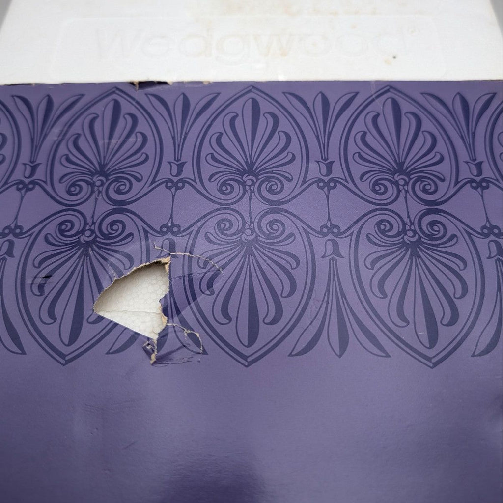 Purple patterned presentation box with cut-out window for Wedgwood Christmas plate