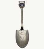 Shovel-shaped collector spoon with Minnesota loon and state map emblem, 1980