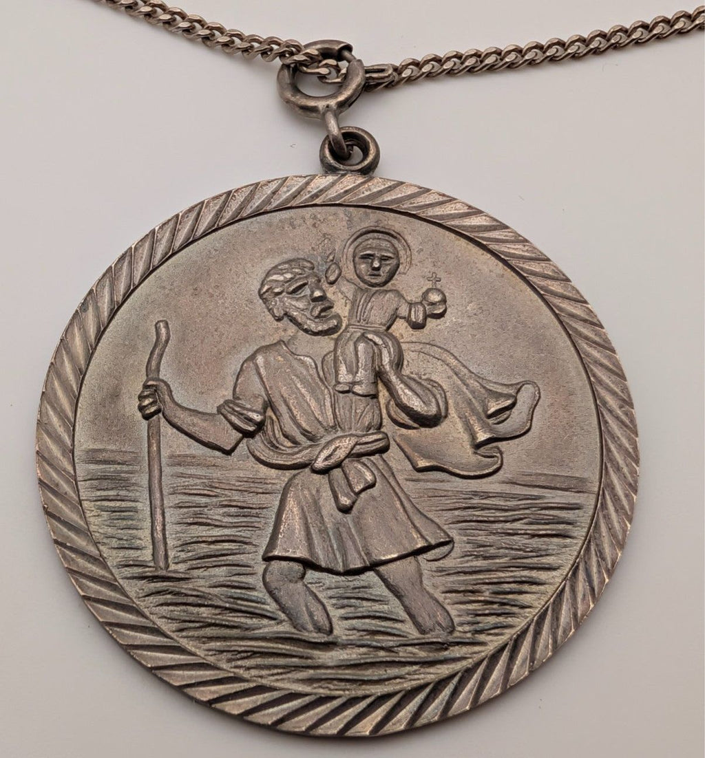 Sterling silver St Christopher pendant on oval textured bail and chain