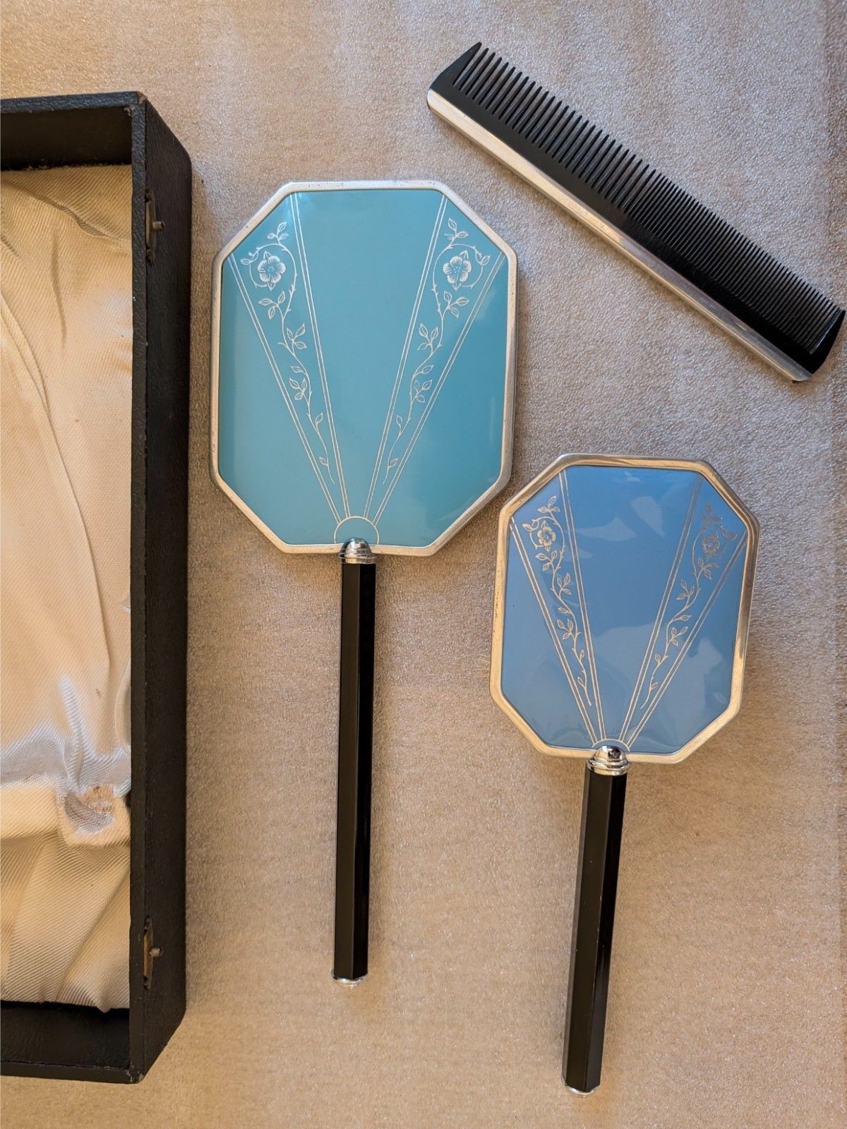 Blue octagonal handheld mirror and brush with comb and black handles