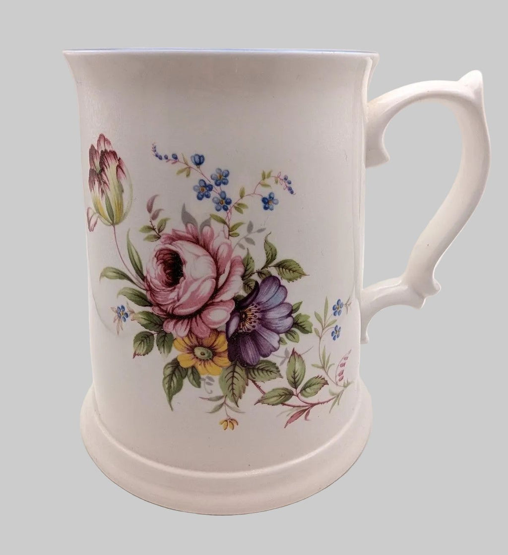 White floral bone china mug tankard with pink rose and blue flower design, curved handle