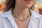 Green glass bead choker necklace with turtle charm pendant and red accents