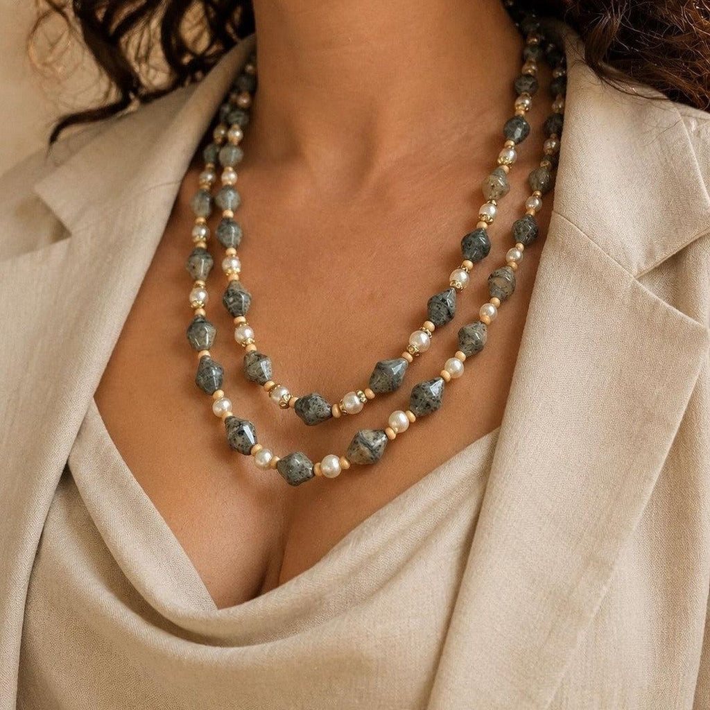 Triple-strand opera necklace with grey speckled beads and small pearl-like beads