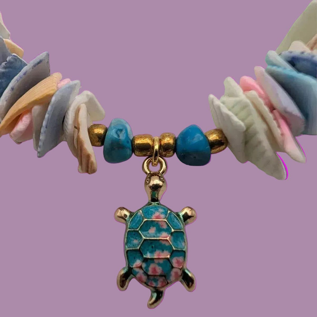 Turquoise turtle pendant on turquoise shell and bead choker