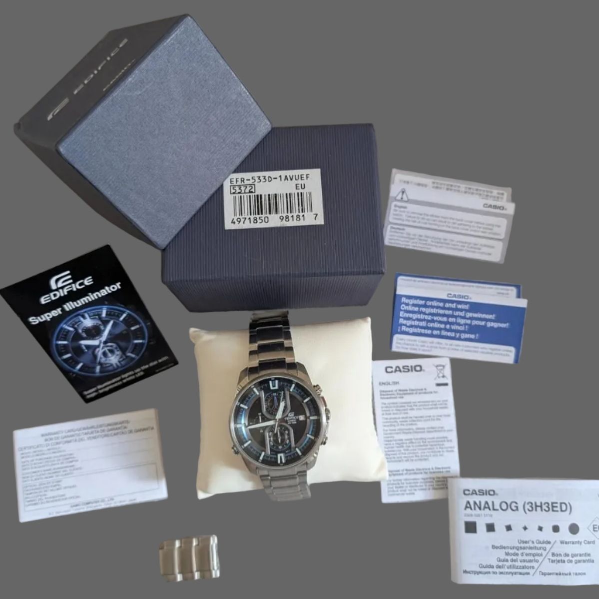 Men's stainless steel chronograph watch with blue-accent black dial and bracelet