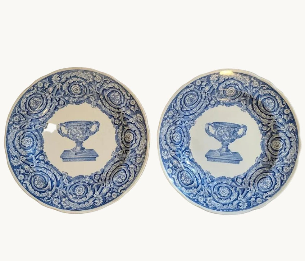 Pair of blue-and-white porcelain dinner plates, ornate urn border, 24 cm.