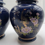 Cobalt blue ceramic ginger jar with gold peacock and flower scene on body