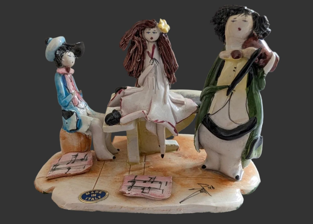 Lino Zampiva signed pottery musical trio figurine: three seated musicians, sheet music on base