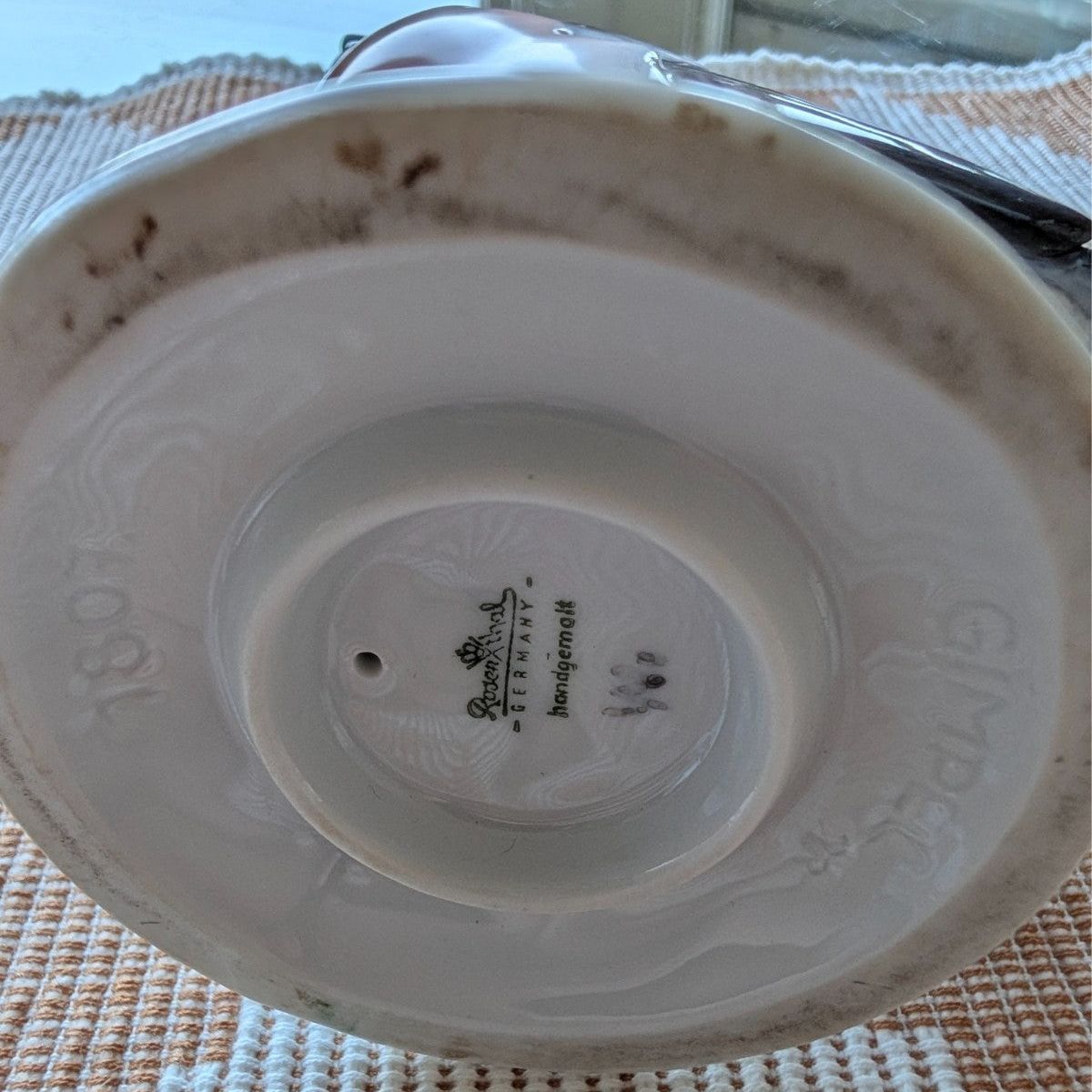 Porcelain figurine base underside with printed Germany mark and model 1807