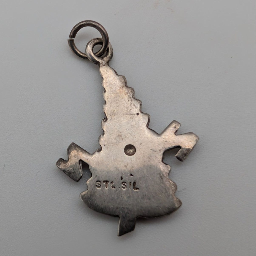 Sterling silver fern charm pendant back with stamped marks and bail loop