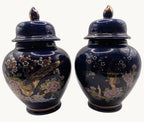 Pair of cobalt blue ceramic ginger jars, gold peacock and floral designs