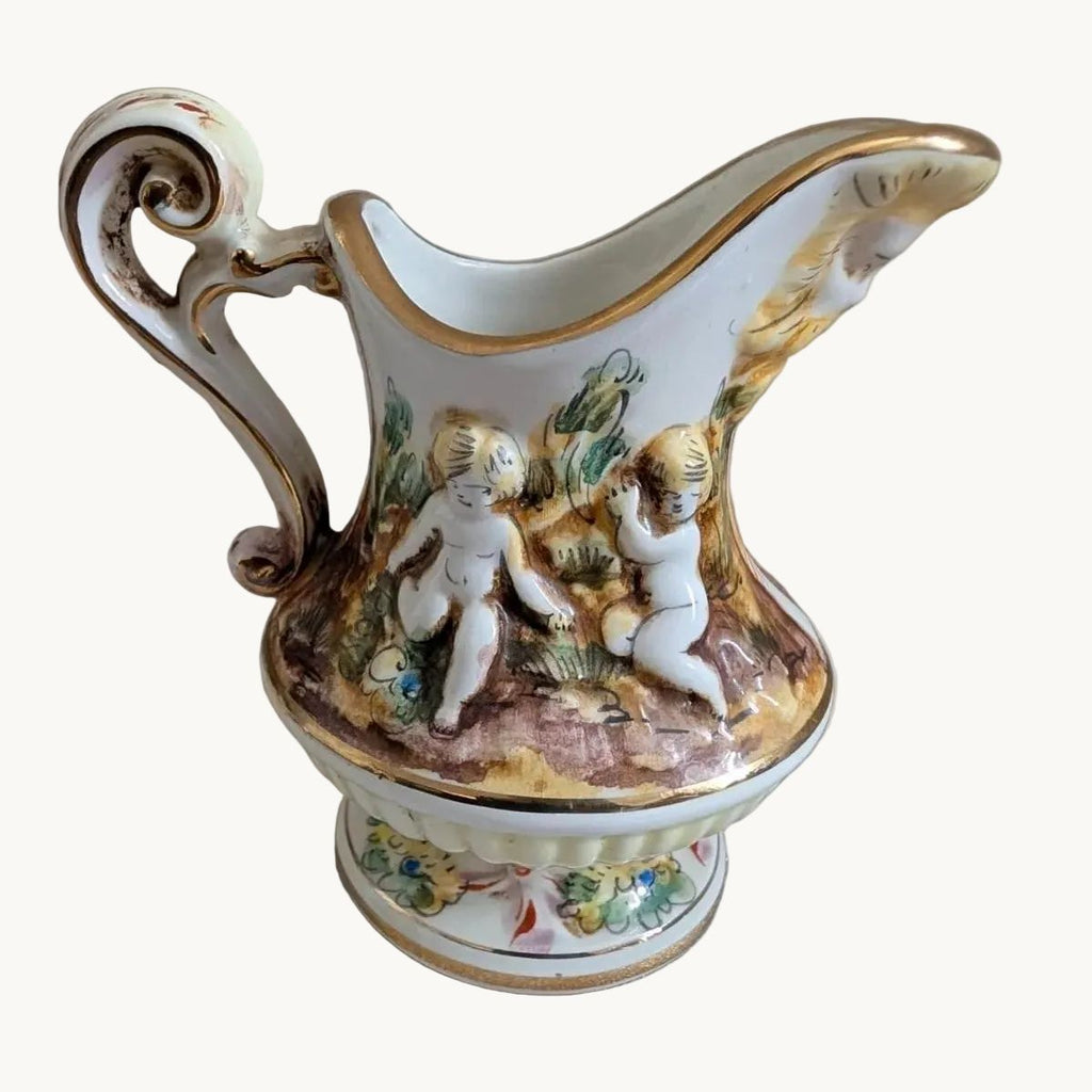 Ceramic jug vase with cherub putti relief, colorful scenes, gold gilt trim