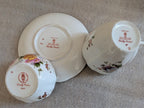 Royal Crown Derby bone china pieces, undersides with floral posies and markings