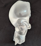 Frosted crystal cat sculpture, side profile with curled tail, textured facial markings
