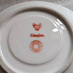 Porcelain dish base with Alhambra maker stamp in orange