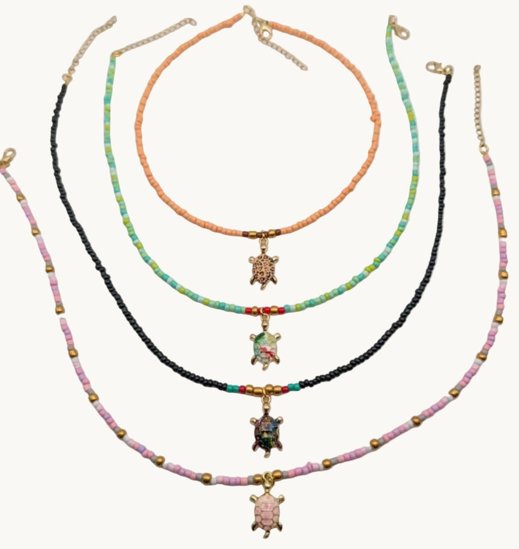Beaded sea turtle choker necklace with multicolor seed beads and gold-tone turtle pendant