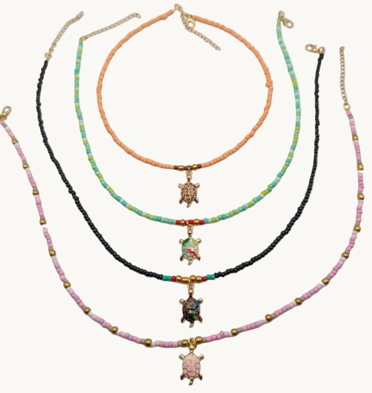 Beaded sea turtle choker necklace with multicolor seed beads and gold-tone turtle pendant