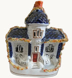 Ceramic cottage pastille burner with blue roof and village windows, decorative facade