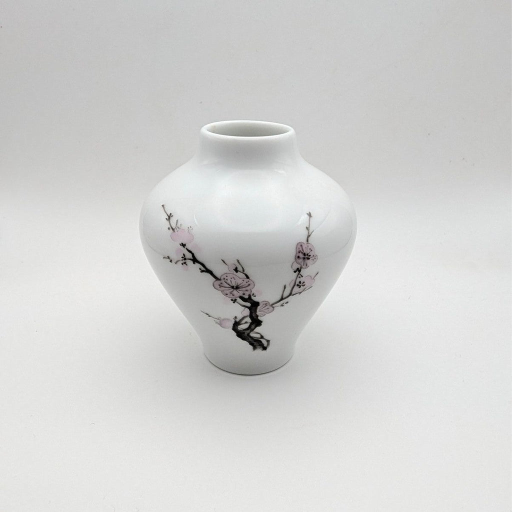 Porcelain bud vase, white with pink cherry blossom and tree-branch design