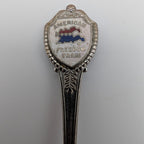 Souvenir collector spoon with top crest reading Freedom Train and beaded border