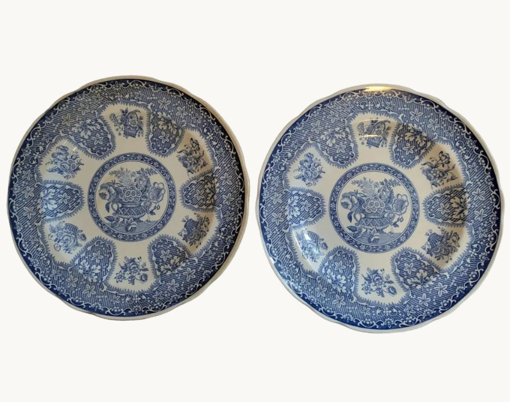 Blue-and-white filigree dinner plates, round pair with ornate center medallions