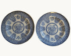 Blue-and-white filigree dinner plates, round pair with ornate center medallions