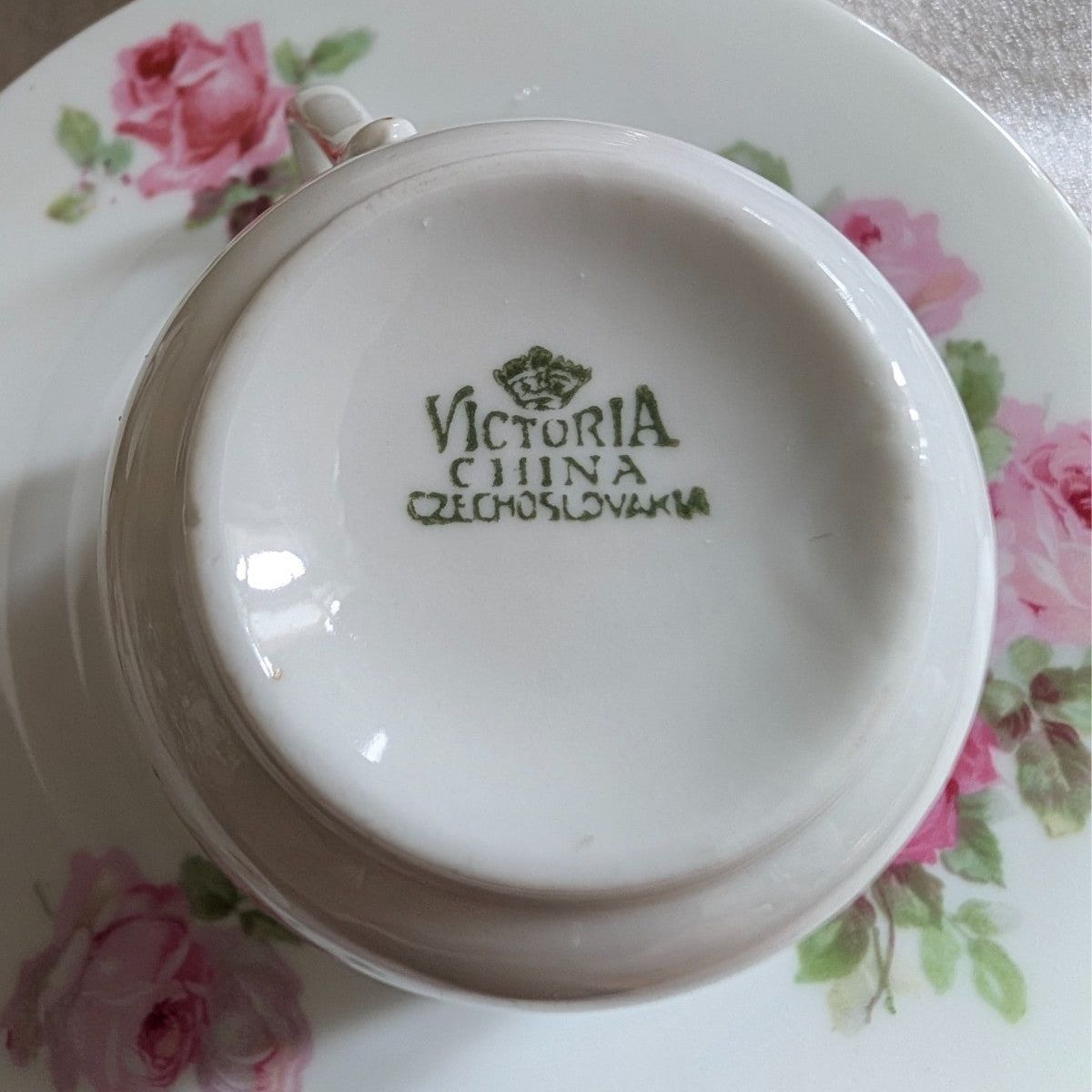 Porcelain teacup with Victoria China Czechoslovakia mark, pink rose floral decoration