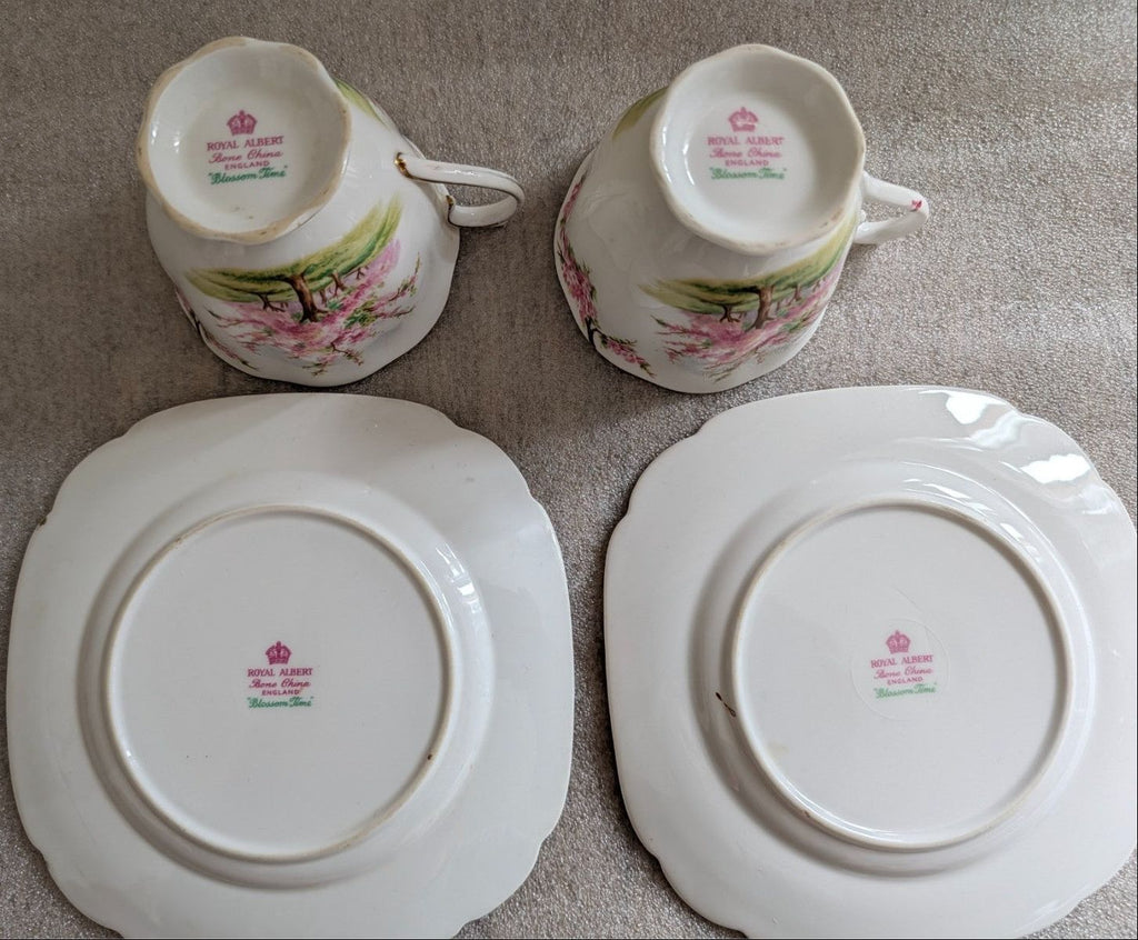 Royal Albert bone china teacups and plates, underside stamps and floral accents