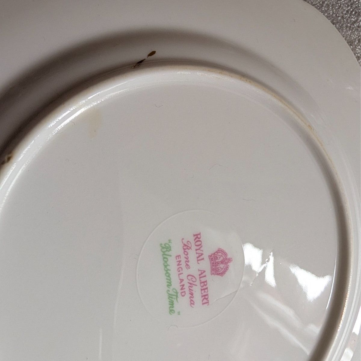 Royal Albert bone china side plate underside, round maker stamp in pink