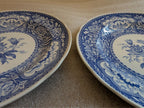 Pair of blue and white floral dinner plates, decorative scalloped rim