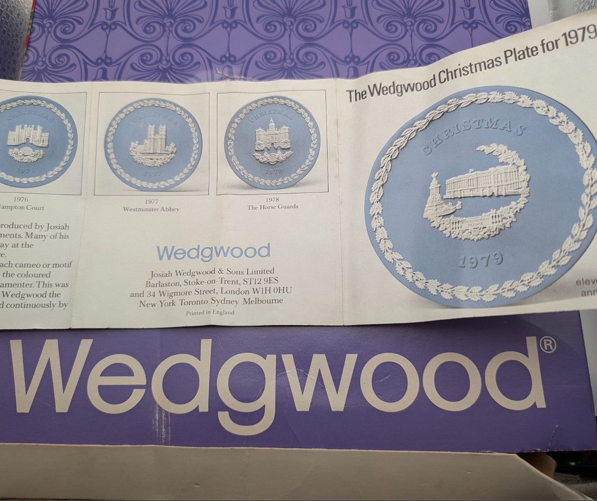 Wedgwood Christmas plate in purple retail box with blue plate image