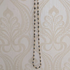 Long opera necklace with grey speckled bead strands and pearl-like bead details