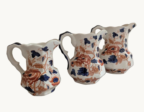 Set of 3 white ironstone hydra jugs with blue and terracotta floral pattern