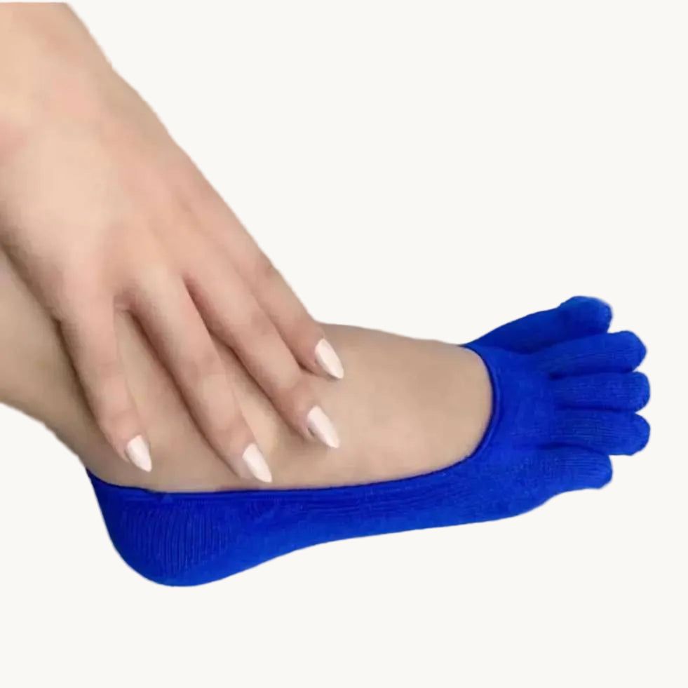 A person's foot and hand wearing a bright blue five-toe ribbed sock on a light gray background.