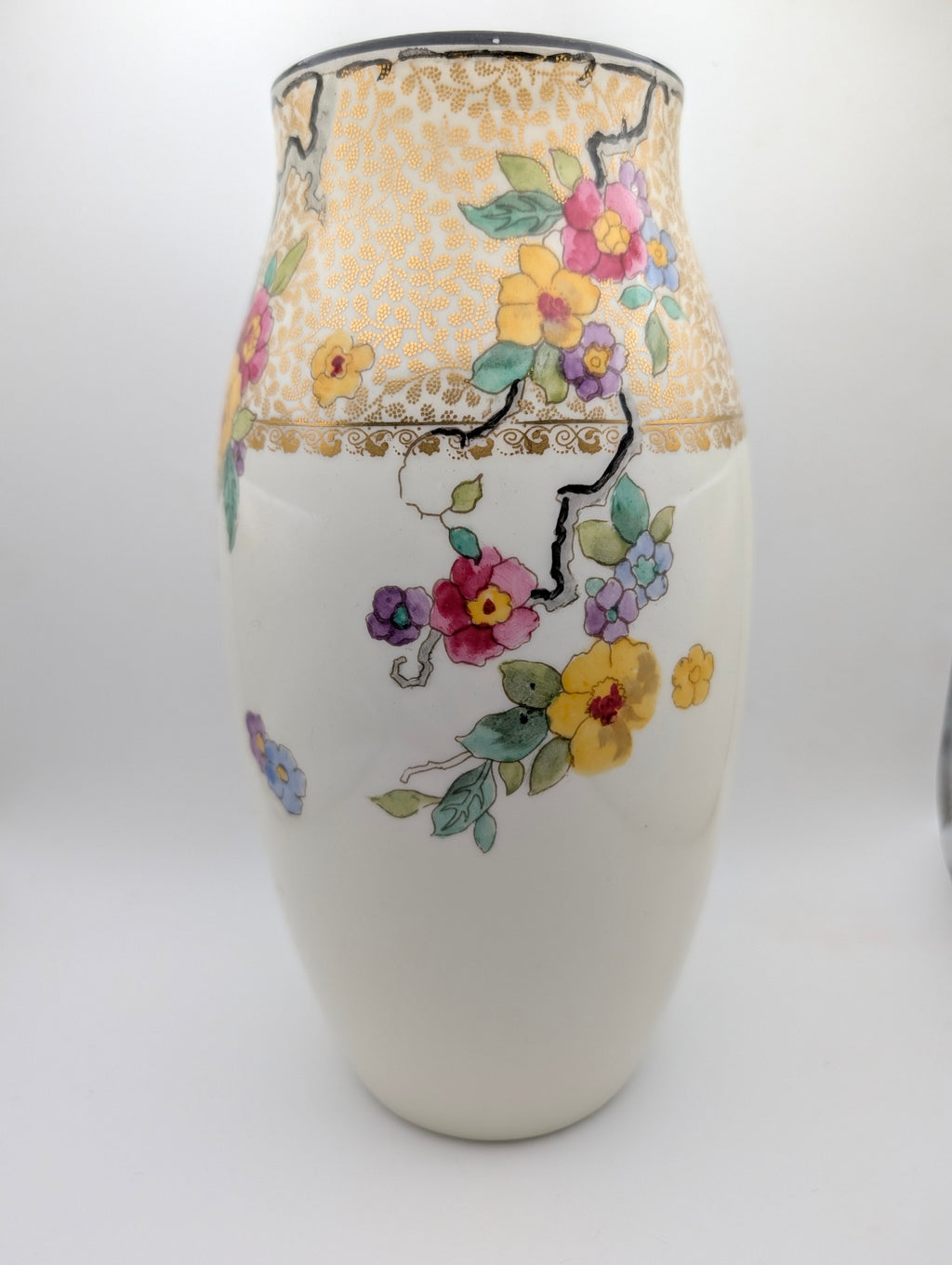 Reverse view of Royal Doulton floral vase with colourful flowers