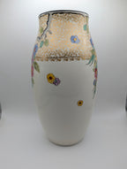 Side view of Royal Doulton England floral decorative vase
