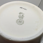 Royal Doulton England backstamp and indistinct painted reference on vase base