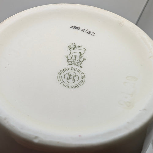 Royal Doulton England backstamp and indistinct painted reference on vase base