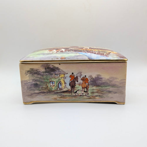 Front view of Crown Devon musical jewellery box with riders and horses