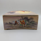 Reverse view of Crown Devon fox hunting scene ceramic music box