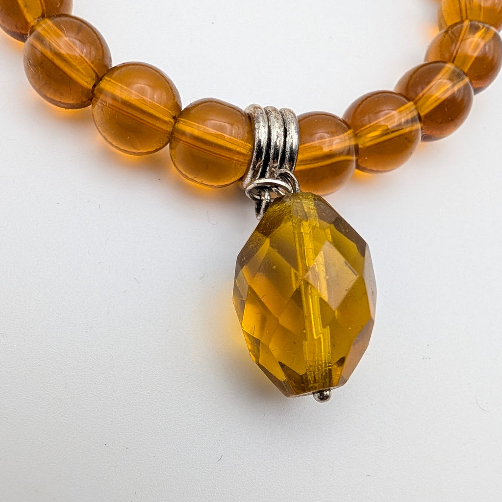 Amber-Brown Beaded Stretch Bracelet with Faceted Drop Charm
