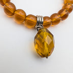 Amber-Brown Beaded Stretch Bracelet with Faceted Drop Charm
